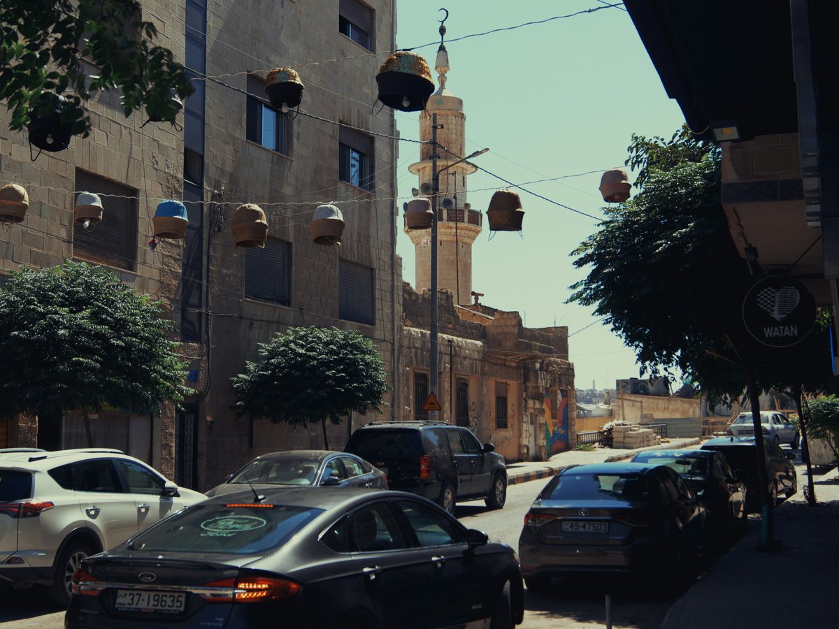 cars parked on the side of a street