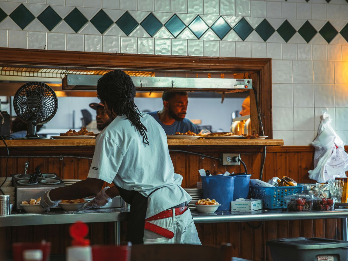 a person cooking in a kitchen