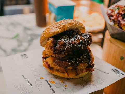 A delicious, double-decker fried chicken sandwich.