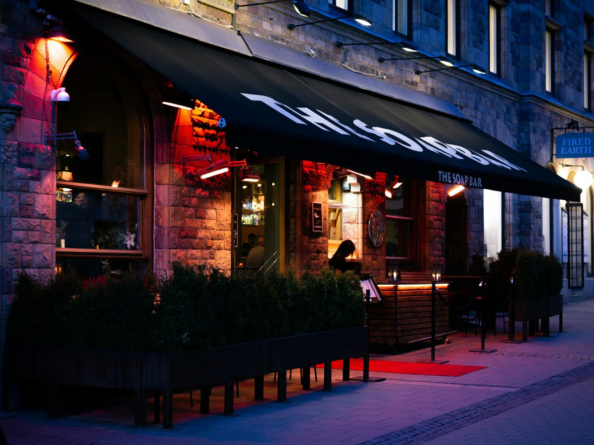 a restaurant on a city street at night