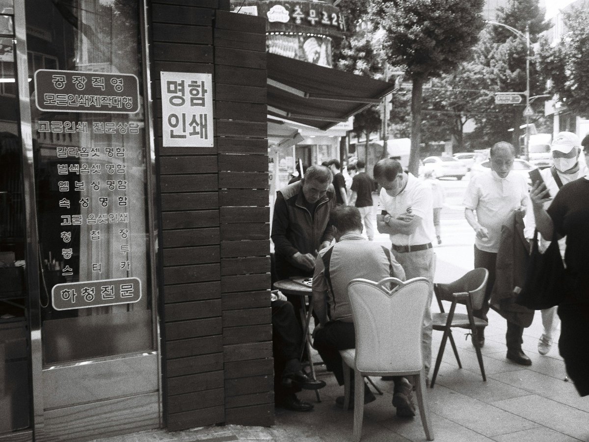 a group of people sitting at a table