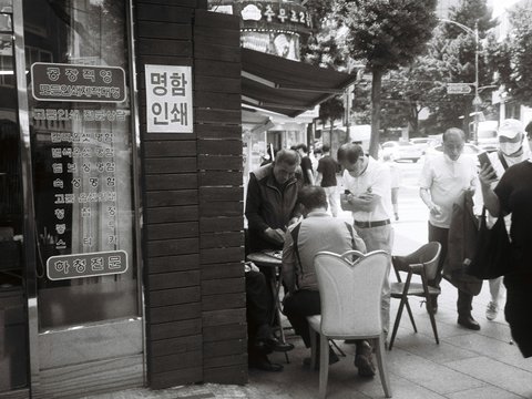 a group of people sitting at a table