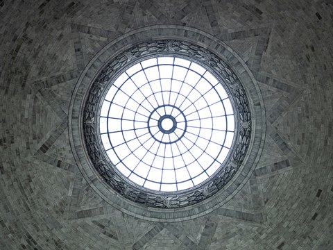 a circular window in the ceiling of a building