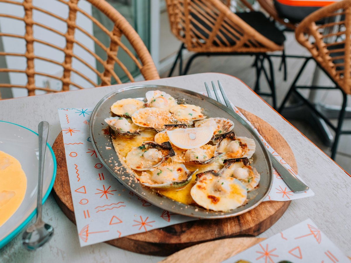 a plate of food sitting on top of a table