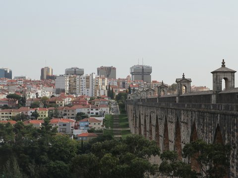 a view of a city from a hill