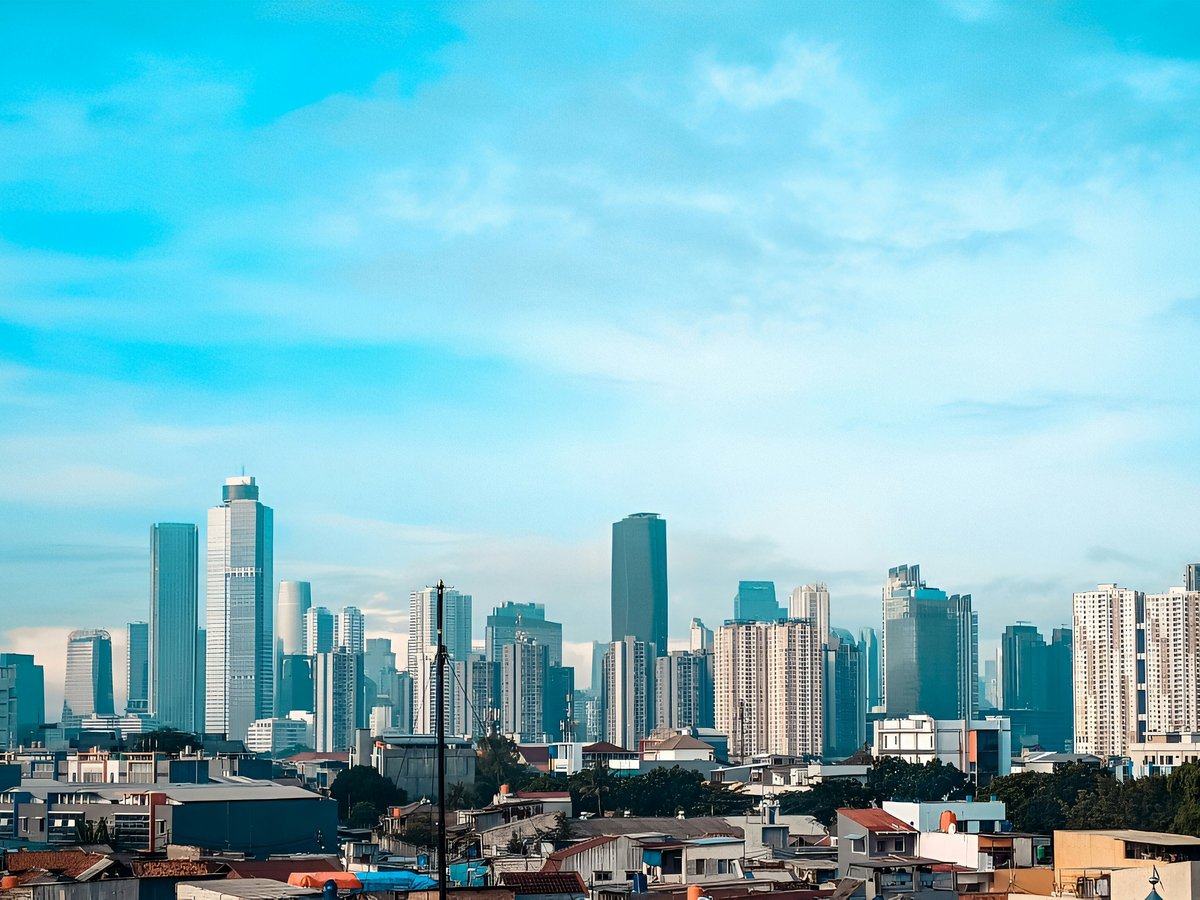 a view of a city with tall buildings