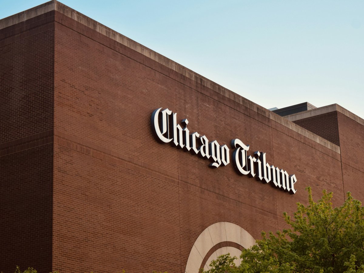 a brick building with a sign on the side of it